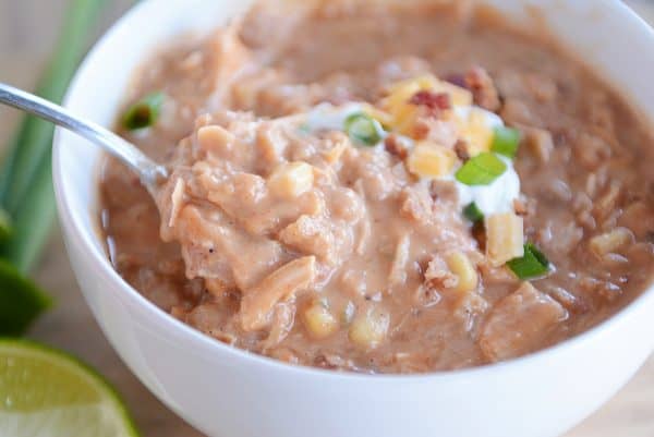 Scoop of jalapeno popper white bean chicken chili.