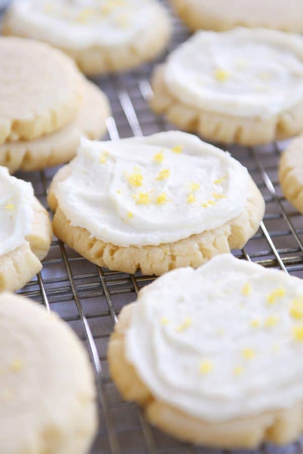 Frosted lemon swig sugar cookies on wire cooling rack.