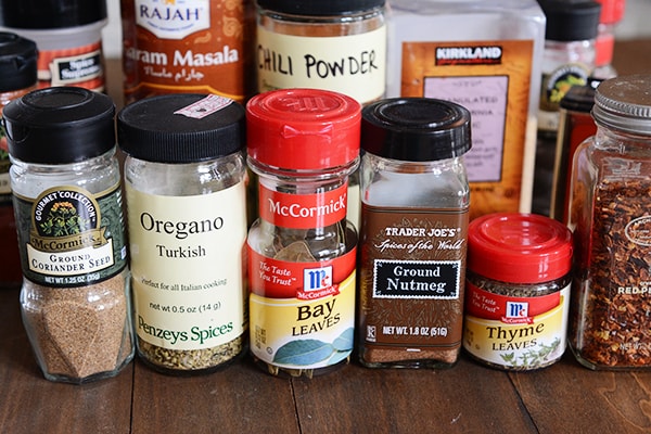 A bunch of baking spices on a countertop. 