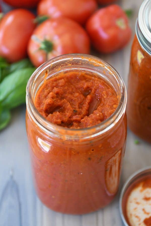 Homemade canned spaghetti sauce in quart jar.