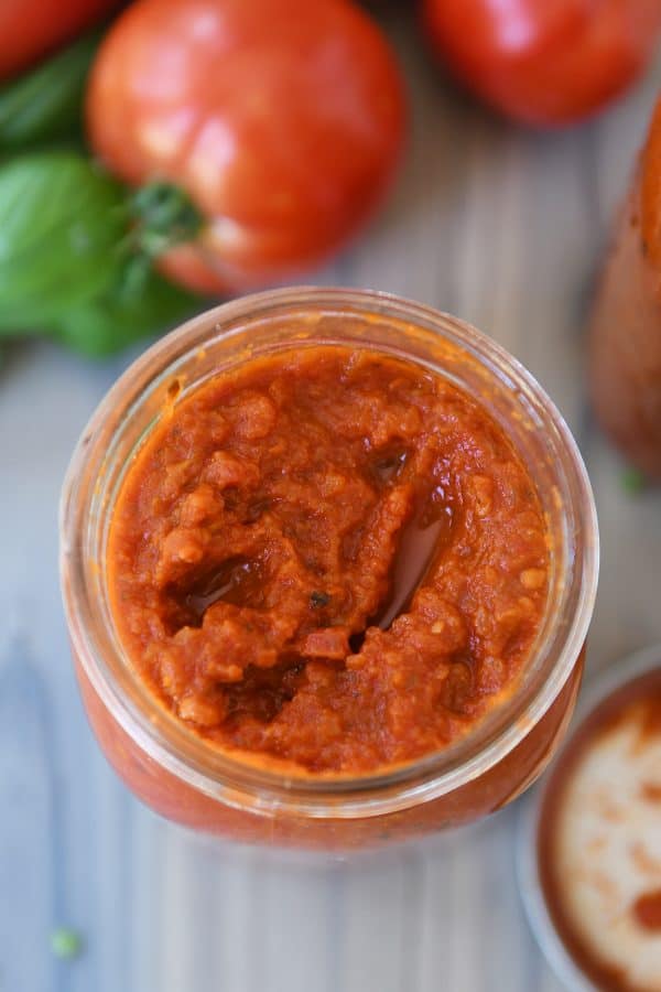 Homemade canned spaghetti sauce in quart jar.