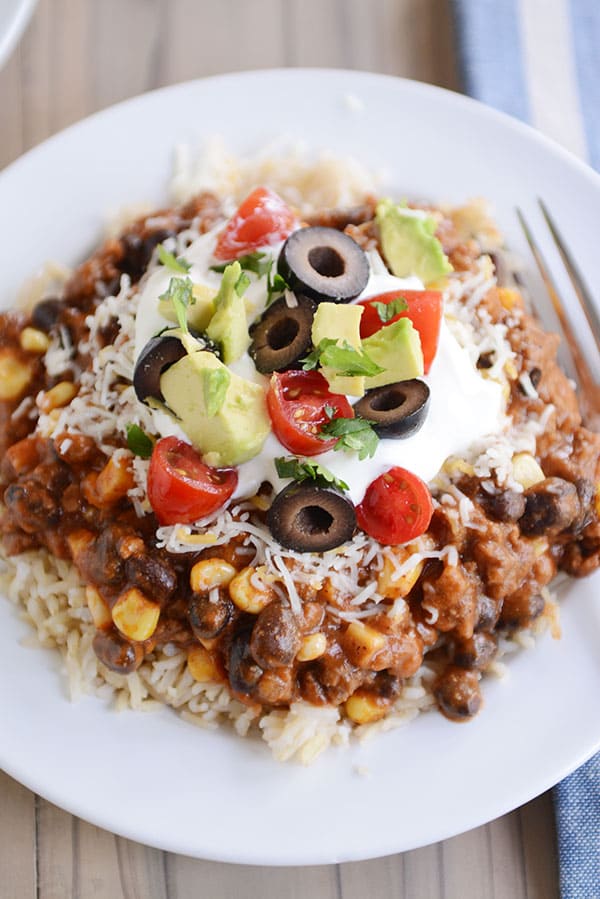 Mexican Haystacks: a smorgasbord of delicious taco flavors simmered together in a tasty sauce served over rice or quinoa. Easy, fast, yummy!