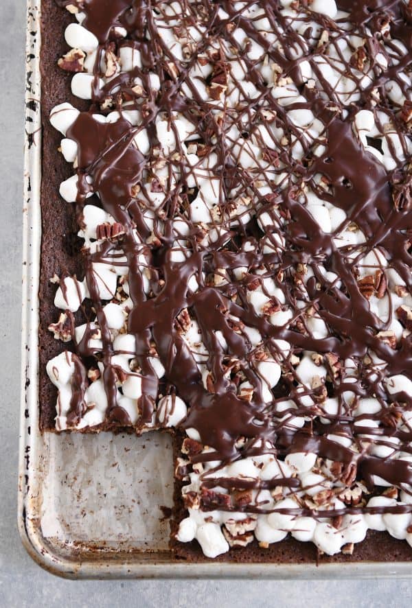 Top down view of sheet pan Mississippi Mud Bars with a bar cut out and removed.