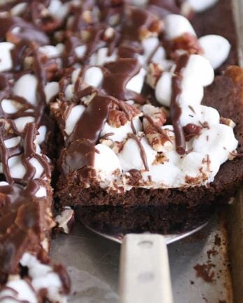 Spatula removing Mississippi Mud Bars from sheet pan.