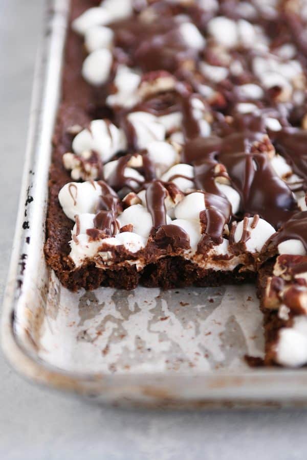 Sheet pan Mississippi Mud Bars with a bar cut out and removed.