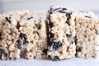 Oreo rice krispie treats side by side on white tray.