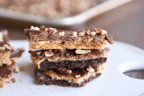 Stack of easy graham cracker toffee with peanut butter.