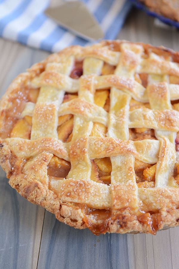 A lattice-topped fresh peach pie. 