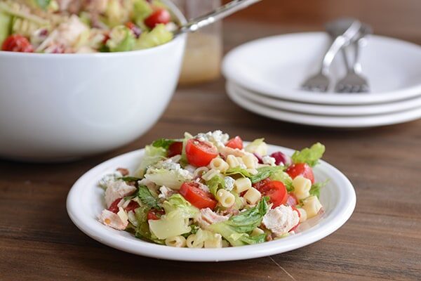A white plate of Portillo's chopped salad. 
