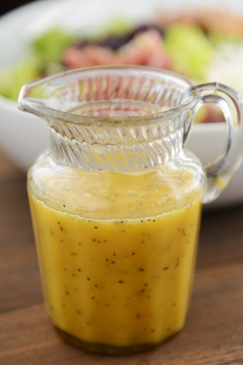 A big pitcher of homemade poppy seed mustard vinaigrette. 