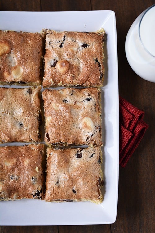 A top view of golden brown meringue-topped chocolate chip bars.