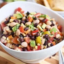 Cowboy caviar dip in white bowl.