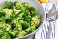 Skillet with roasted broccoli.
