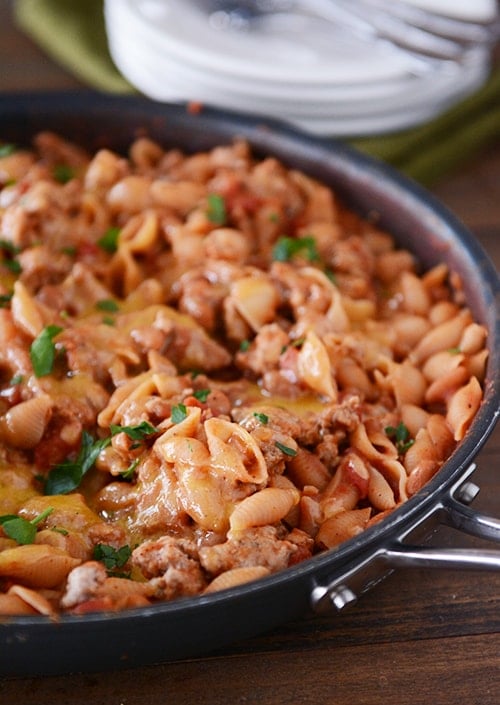 A skillet full of a taco pasta shell dinner. 