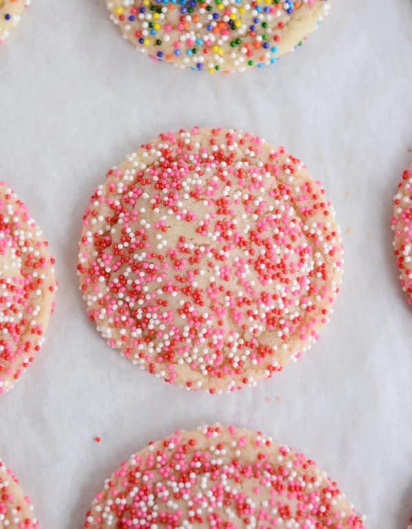 A sugar cookie with Valentine's sprinkles. 