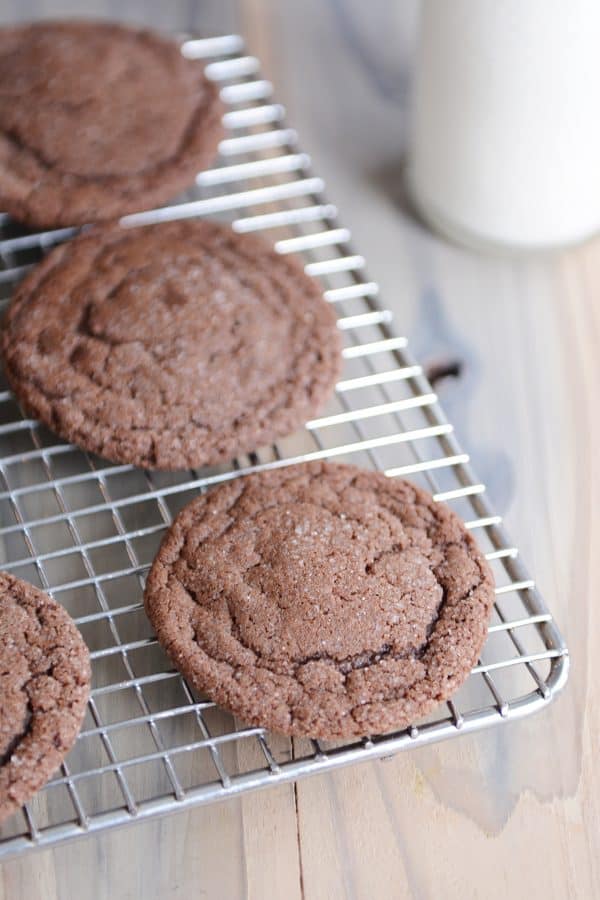 Chocolate sugar cookies on cooling rack.