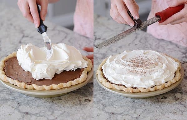 Side by side pictures of a chocolate pie getting whipped cream spread on top and cocoa getting dusted on top.