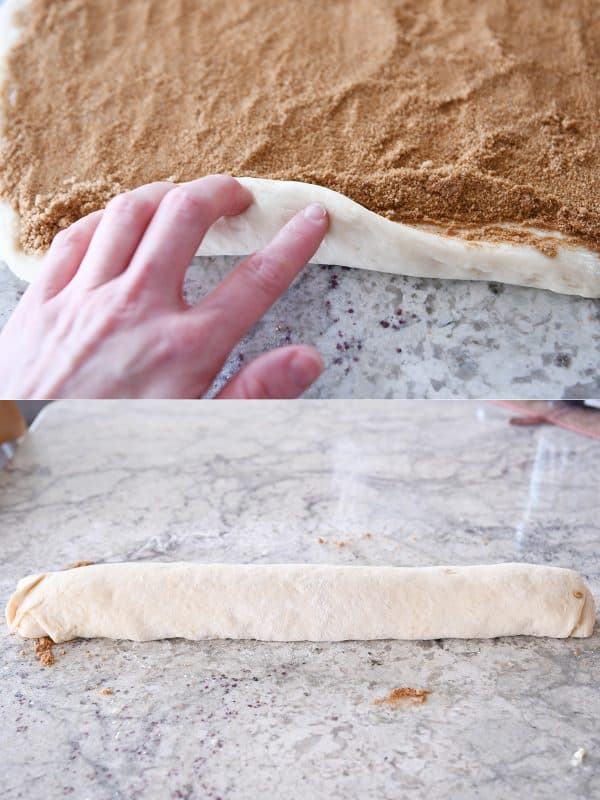 Rolling up cinnamon roll dough.