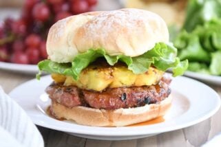 Teriyaki turkey burgers with grilled pineapple, lettuce, and soft bun.