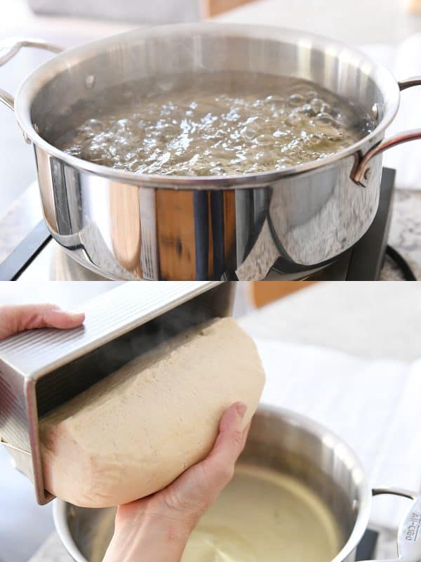 a pot of boiling water with a loaf of bread about to go in