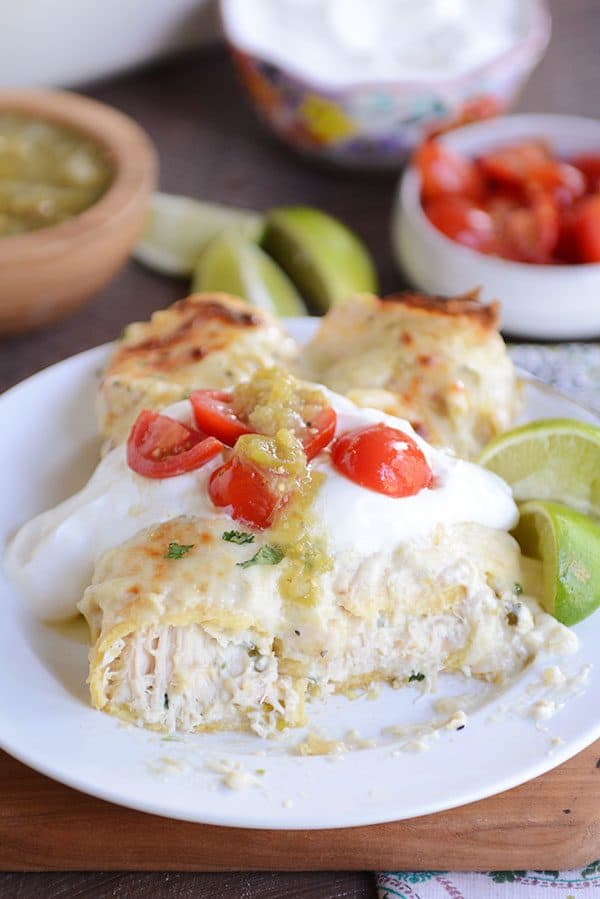 If you haven't had these green chile chicken enchiladas, you are missing out! The quick and easy from-scratch cheesy, creamy white sauce takes them over the top!